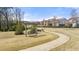 Bench swing and walking path in community park at 5247 Flannery Chase Sw, Powder Springs, GA 30127