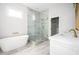 Modern bathroom with soaking tub and glass shower at 600 Jones Rd, Roswell, GA 30075