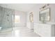 Elegant bathroom with marble flooring, double vanity, and large shower at 600 Jones Rd, Roswell, GA 30075