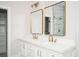 Elegant bathroom with double vanity and gold fixtures at 600 Jones Rd, Roswell, GA 30075