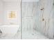 Spa-like bathroom with marble shower and soaking tub at 600 Jones Rd, Roswell, GA 30075