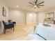 Bright bedroom featuring hardwood floors and a ceiling fan at 600 Jones Rd, Roswell, GA 30075