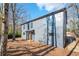 Gray house exterior with wood accents and backyard at 600 Jones Rd, Roswell, GA 30075