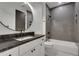 Modern bathroom with grey tile shower and bathtub at 884 Derrydown Way, Decatur, GA 30030