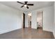 Bright bedroom featuring hardwood floors, ceiling fan and ensuite bathroom at 884 Derrydown Way, Decatur, GA 30030