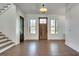 Bright entryway with hardwood floors and a wooden door at 884 Derrydown Way, Decatur, GA 30030