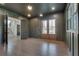 Spacious home office features wood floors, custom built-ins, and French doors at 884 Derrydown Way, Decatur, GA 30030