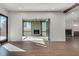 Bright living room with hardwood floors and glass doors leading to a patio at 884 Derrydown Way, Decatur, GA 30030