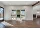 Bright living room with hardwood floors and glass doors leading to a patio at 884 Derrydown Way, Decatur, GA 30030