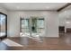 Bright living room with hardwood floors and glass doors leading to a patio at 884 Derrydown Way, Decatur, GA 30030