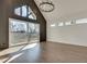 Spacious main bedroom with sliding glass doors leading to a deck and wood flooring at 884 Derrydown Way, Decatur, GA 30030