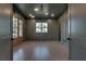 Home office with dark green walls, hardwood floors, and french doors at 884 Derrydown Way, Decatur, GA 30030