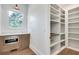 Walk-in pantry with ample shelving for storage needs at 884 Derrydown Way, Decatur, GA 30030