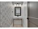 Modern powder room with herringbone patterned wallpaper at 884 Derrydown Way, Decatur, GA 30030