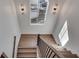 Modern staircase with wood treads and metal railing at 884 Derrydown Way, Decatur, GA 30030