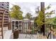 Private balcony with seating area, offering a treetop view at 22 Collier Nw Rd # 9, Atlanta, GA 30309