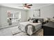 Cozy bedroom with a plush bed and a large window nook for natural light at 29 La Rue Nw Pl, Atlanta, GA 30327
