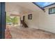 Side view of the house showing carport and stairs leading to the back door at 2740 Flagstone Se Dr, Atlanta, GA 30316