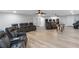 Spacious basement area with multiple seating arrangements, game area, and entertainment space at 1416 Walcutts Nw Way, Marietta, GA 30064