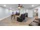 Finished basement featuring laminate flooring, game area, seating, and pot lights at 1416 Walcutts Nw Way, Marietta, GA 30064
