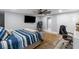 Bedroom with a large bed, flat-screen TV, closet, and neutral decor at 1416 Walcutts Nw Way, Marietta, GA 30064