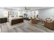 Modern bedroom featuring sleek flooring, a ceiling fan, and sitting area at 1416 Walcutts Nw Way, Marietta, GA 30064