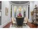 Elegant dining room with large windows, chandelier, and stylish decor at 1416 Walcutts Nw Way, Marietta, GA 30064