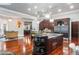 Gourmet kitchen featuring a large island, stainless steel appliances, and granite countertops at 1416 Walcutts Nw Way, Marietta, GA 30064