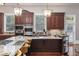 Spacious kitchen with granite counters, a large island, and custom cabinets at 1416 Walcutts Nw Way, Marietta, GA 30064