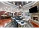 Open-concept living room and kitchen featuring stone fireplace, wood floors, and modern finishes at 1416 Walcutts Nw Way, Marietta, GA 30064