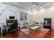 Spacious living room with modern decor, hardwood floors, and large windows at 1416 Walcutts Nw Way, Marietta, GA 30064