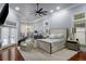 Bright main bedroom with large windows, sitting area, and access to an outdoor patio at 1416 Walcutts Nw Way, Marietta, GA 30064