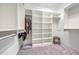 Bright walk-in closet with custom shelves at 2341 Brissett Ln, Brookhaven, GA 30319