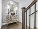 This hallway features a decorative table and mirror at 2341 Brissett Ln, Brookhaven, GA 30319