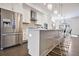 Spacious kitchen featuring stainless steel appliances, ample counter space, and a breakfast bar at 2341 Brissett Ln, Brookhaven, GA 30319