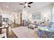 Inviting living room with an open layout, featuring stylish furniture, dark floors and plenty of natural light at 2341 Brissett Ln, Brookhaven, GA 30319