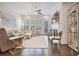 Bright and cozy living room featuring modern furniture, a fireplace, and natural light at 2341 Brissett Ln, Brookhaven, GA 30319