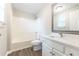 Bright bathroom with white vanity, new countertop, and bathtub at 3950 Yancey Rd, Douglasville, GA 30135