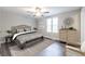 Bedroom with a neutral palette, ceiling fan, and natural light at 3950 Yancey Rd, Douglasville, GA 30135