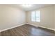 Bedroom with natural light and hardwood floors at 3950 Yancey Rd, Douglasville, GA 30135