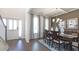 Bright dining room with hardwood floors and a formal dining table at 583 Princeton Elm Pl, Lawrenceville, GA 30045