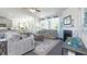 Bright living room featuring a cozy fireplace and hardwood floors at 583 Princeton Elm Pl, Lawrenceville, GA 30045