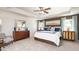 Spacious main bedroom with ample natural light and carpeted floor at 583 Princeton Elm Pl, Lawrenceville, GA 30045