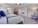 Main bedroom showcasing access to other rooms and a sitting area at 583 Princeton Elm Pl, Lawrenceville, GA 30045