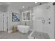 Spa bathroom showcasing a standalone tub and tiled glass shower at 3785 Pilgrim Mill Rd, Cumming, GA 30041