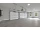 Spacious garage with ample room for parking and storage, offering convenience and security at 3785 Pilgrim Mill Rd, Cumming, GA 30041