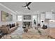 Living room with brick fireplace and hardwood floors at 3785 Pilgrim Mill Rd, Cumming, GA 30041