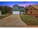 Two-story house with attached garage, newly landscaped lawn, and driveway at 42 Puckett Se Rd, Emerson, GA 30137