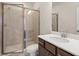 Small bathroom with single vanity and shower at 314 Cornett Way, Lawrenceville, GA 30046