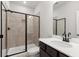 Modern bathroom with a large shower and dark brown vanity at 314 Cornett Way, Lawrenceville, GA 30046